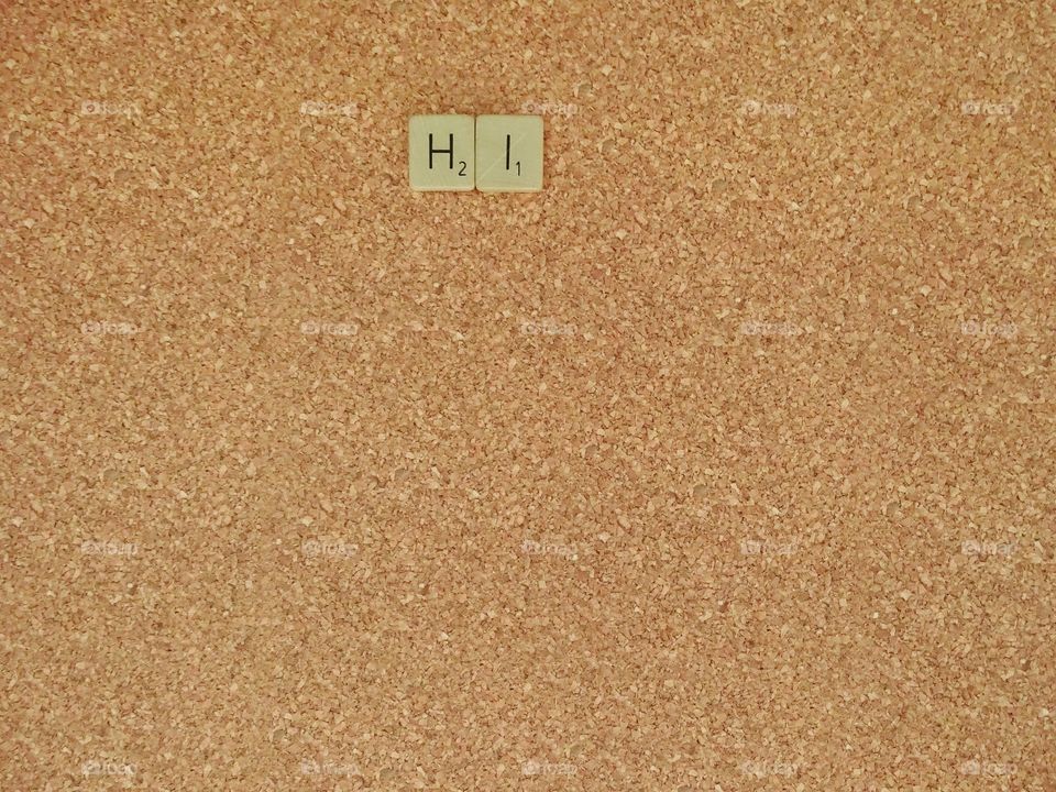 scrabble words on cork board