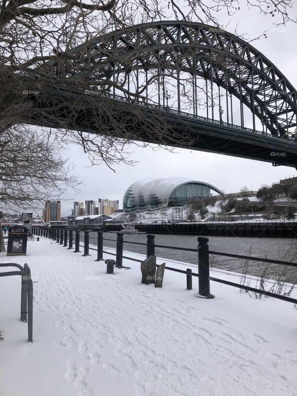 Winter snowy days on newcastlegateshead quayside including the iconic tune bridge 
