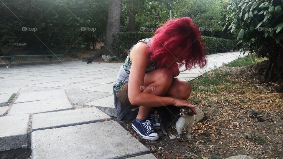 redhead girl and cat