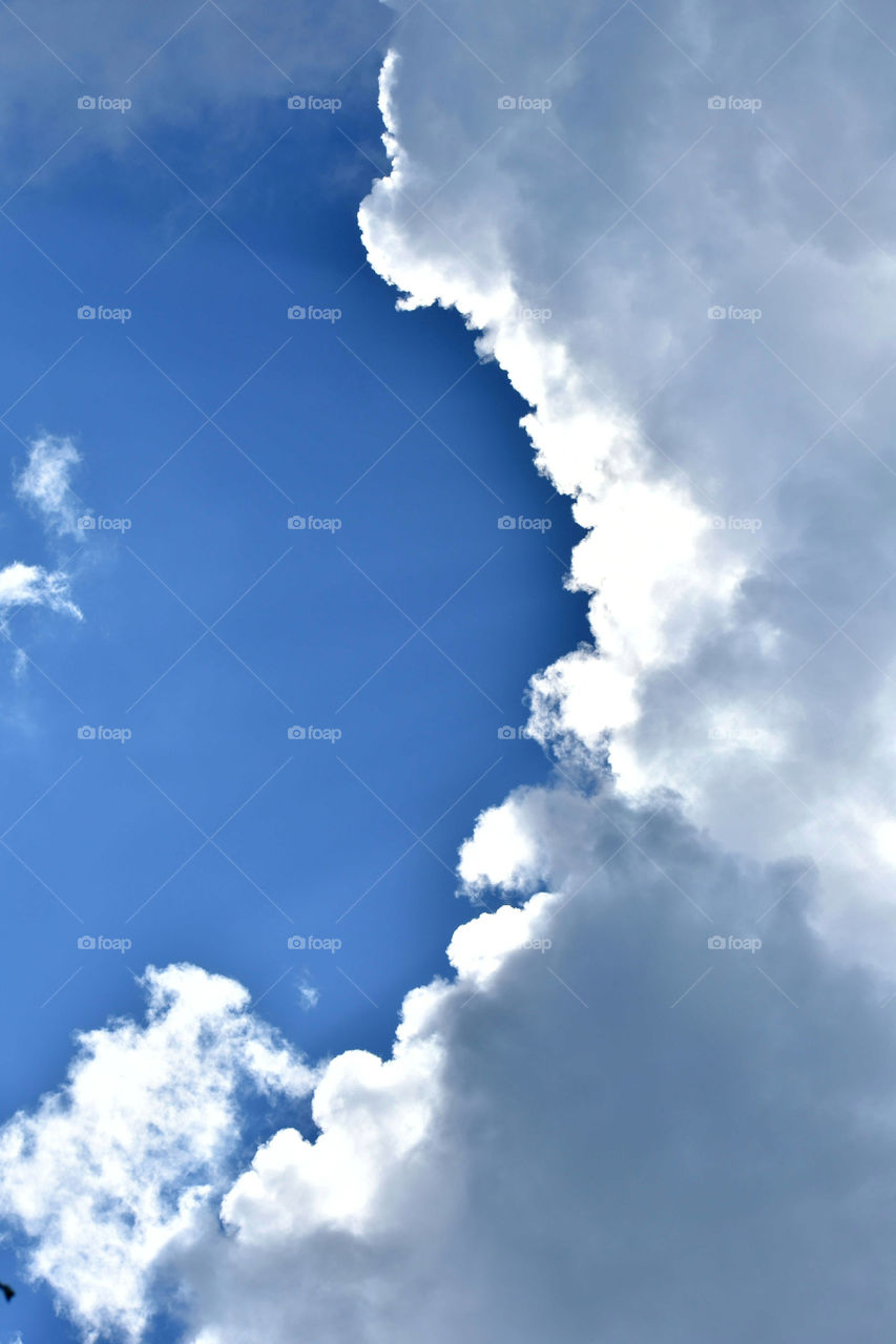Low angle view of clouds in blue sky