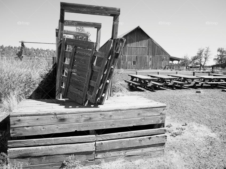 An old weathered barn in the fields in the rural countryside of Oregon.