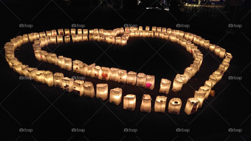 Heart shape candle lights in the dark