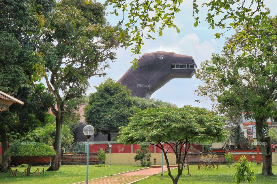 Reptil-shaped building of Reptiles Museum, inside the Indonesia Miniature Garden