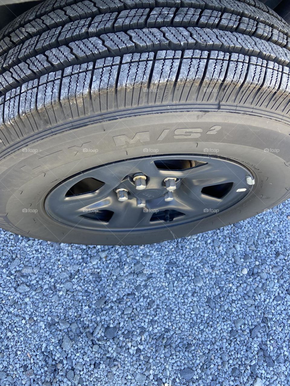 A tire on my Jeep Wrangler, dirty as usual, this time from the gravel it was parked on while I was walking the trail at a local park. It’s always getting in some mess or another, but that’s part of the fun. 