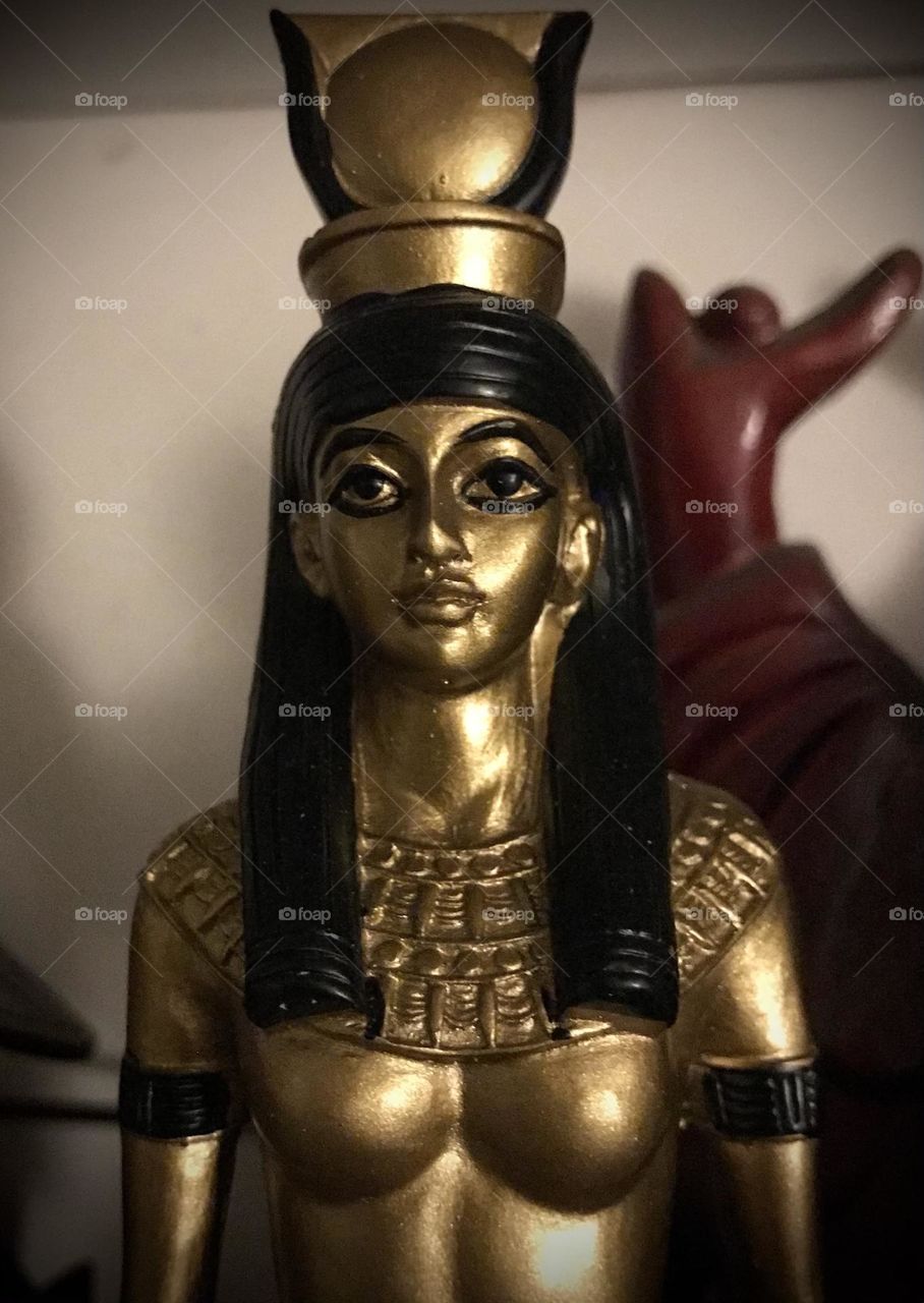 A statue of Hathor. This masterpiece made in the image of the ancient Egyptian Goddess of love and beauty certainly adorns one’s home. Her magickal presence can be felt with the sacred decor.