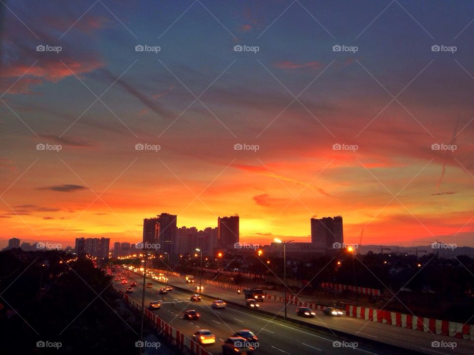 Sunrise on the highway to the city