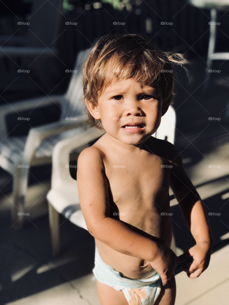 Andrew was playing in the backyard 