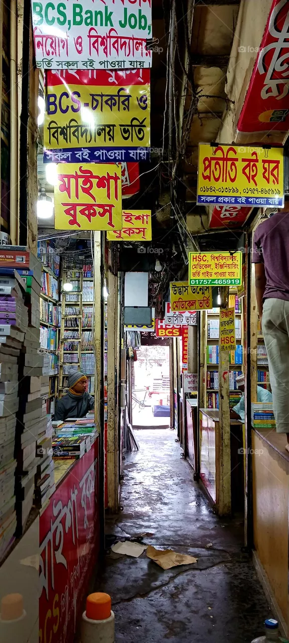 Secondhand bookstall at Nilkhet Book Market. Dhaka, Bangladesh.
