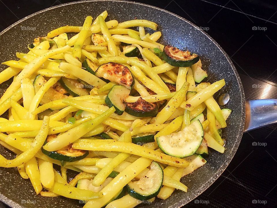 Cooked yellow beans and zucchini 