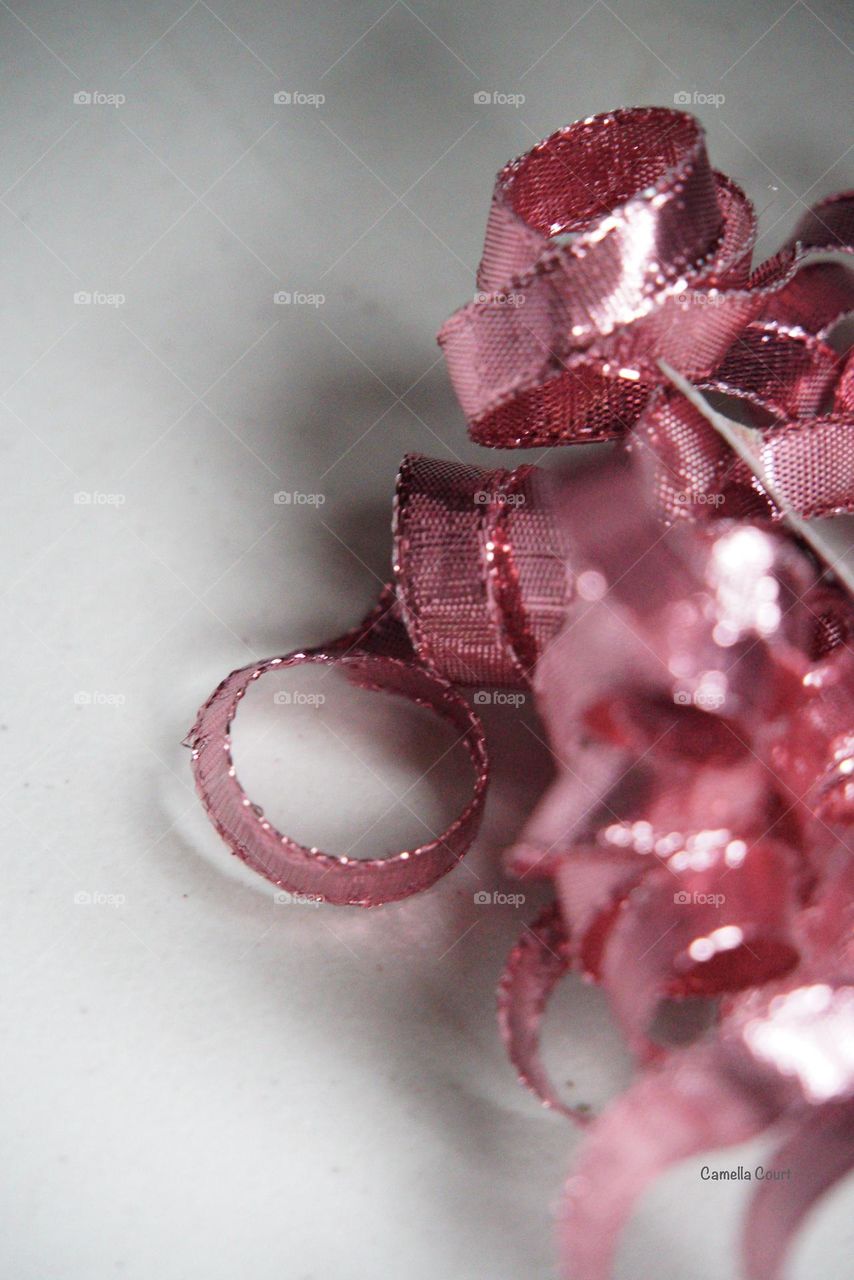Pink ribbon leftover from a party