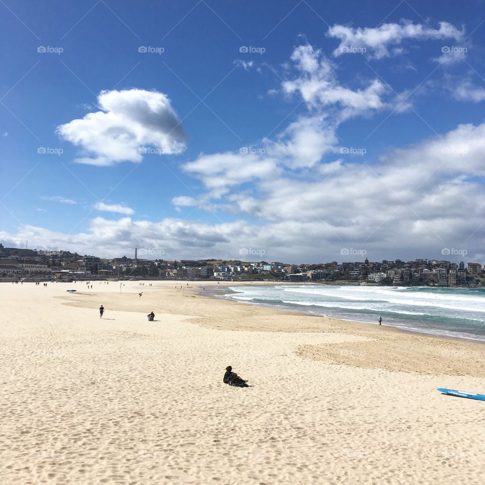 Bondi beach on a rare peaceful day. Definitely worth a visit, the sand is soft and the sea warm! 