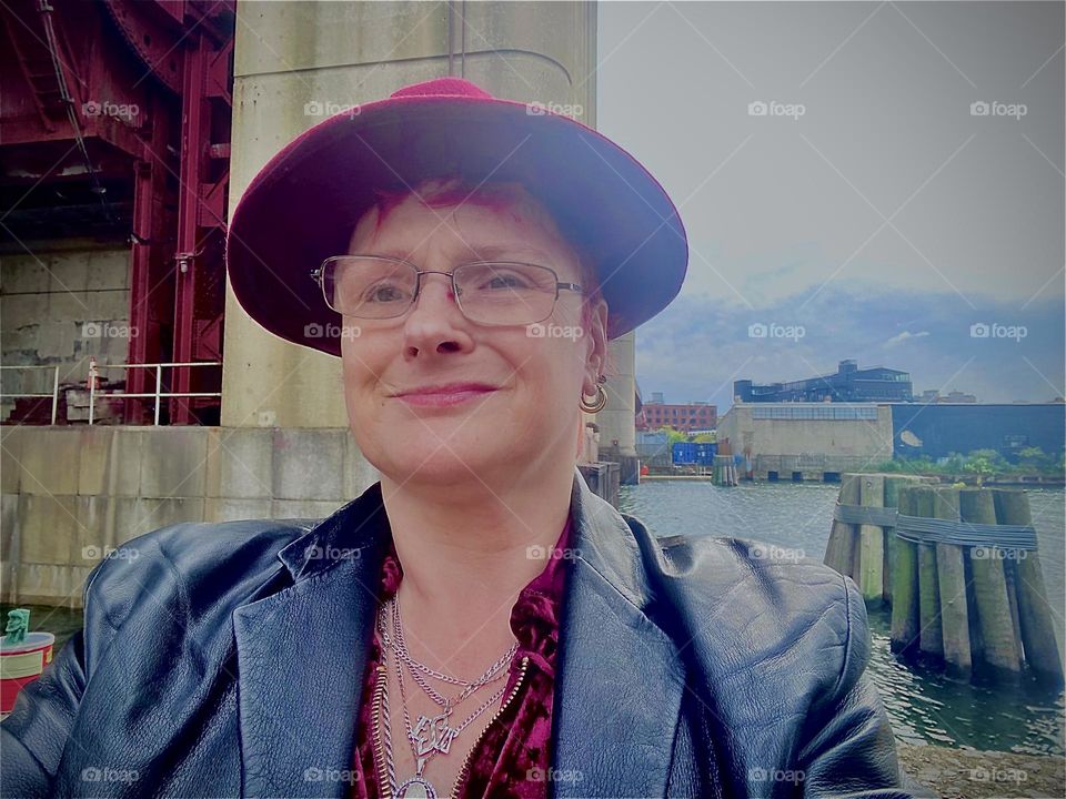 Beneath the “Pulaski Bridge” at “Newtown Creek” in Long Island City, Queens, NY is the vantage point from where we venture out to climb over the wall and walk towards our boat regularly. 2022. Hypnotic Productions