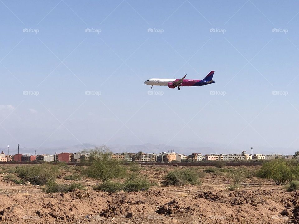 beautiful aircraft flying cross the blue sky