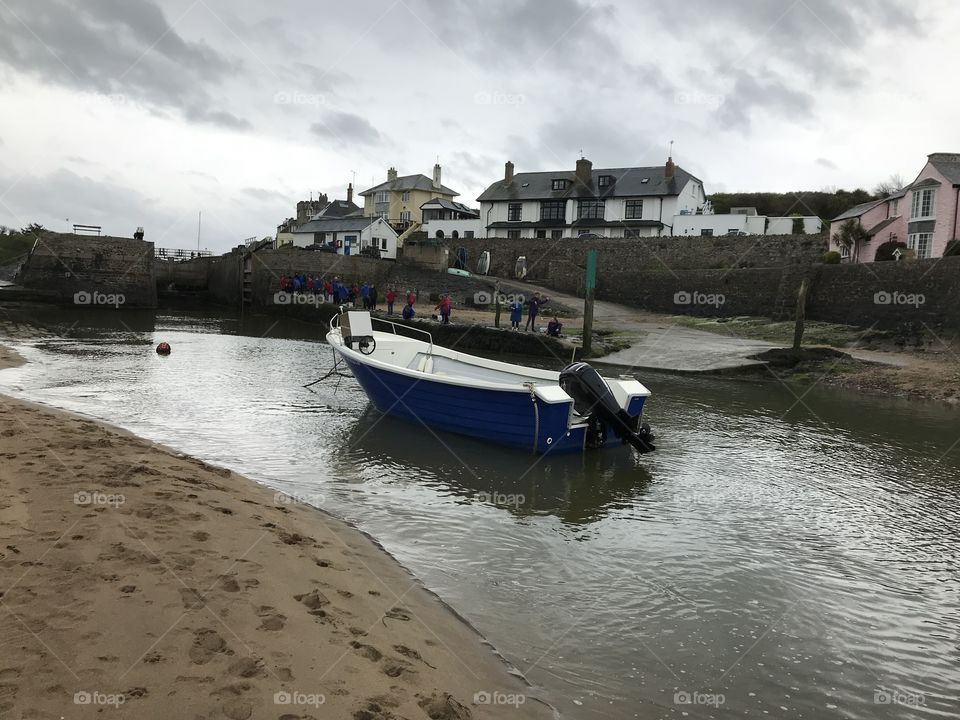 Harbour activity by the seaside of Bude in Cornwall, a premier resort also for surfers.