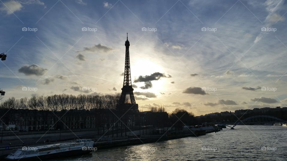 Sunset in Paris. Sunset behind the Eiffel Tower in Paris, France