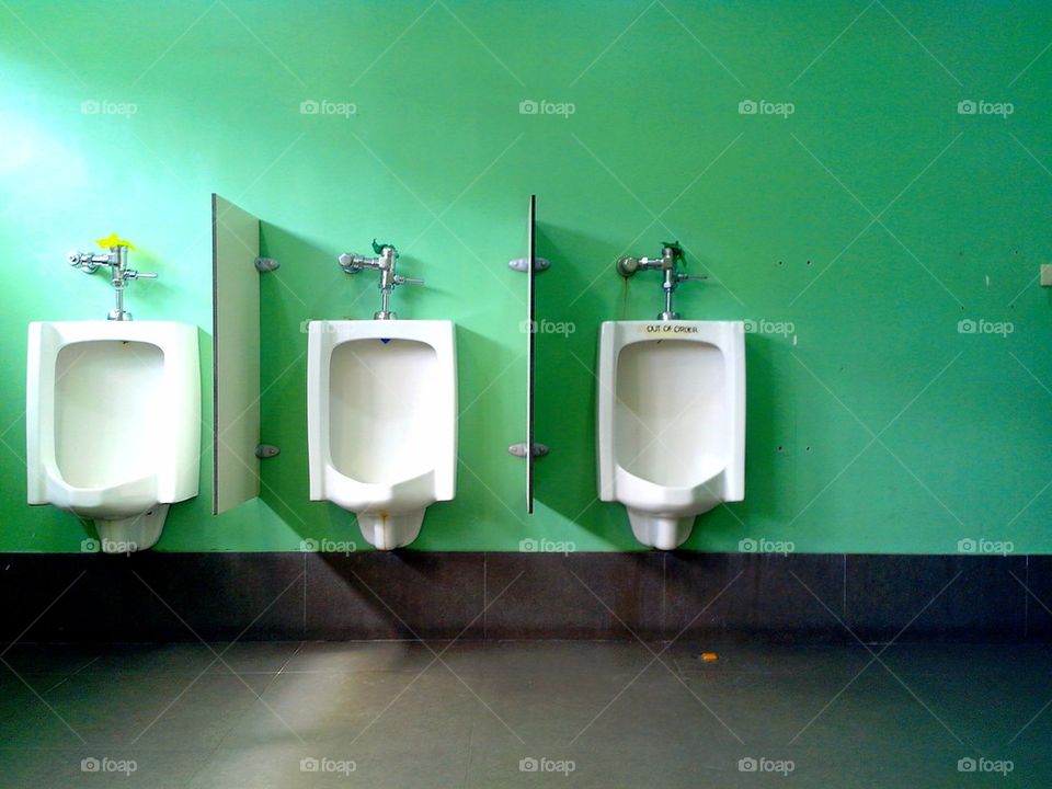 male toilet urinals