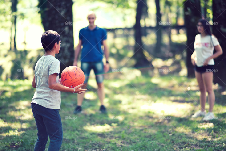 playing football in the woods