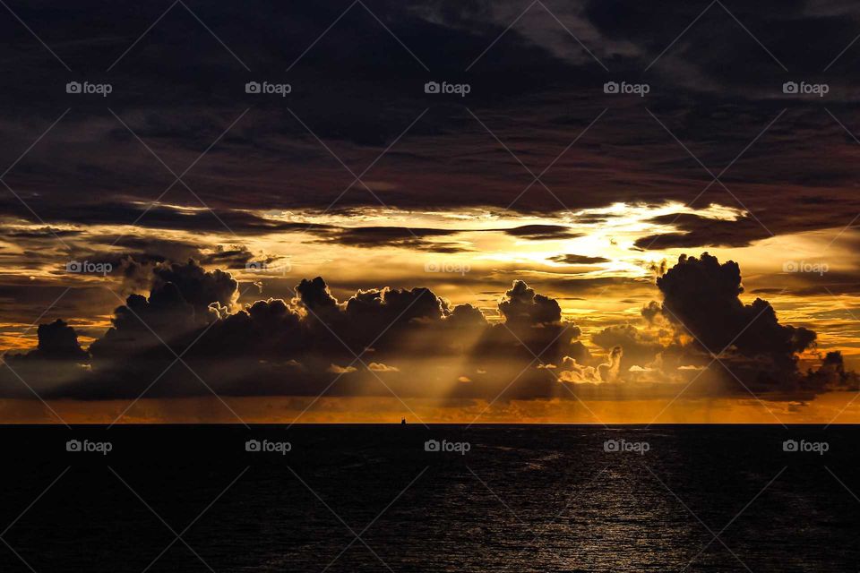 Sunrise vs Sunset - Taken from the balcony of my cabin while cruising...somewhere in the Atlantic Ocean. I love getting up early to take sunrise pictures.