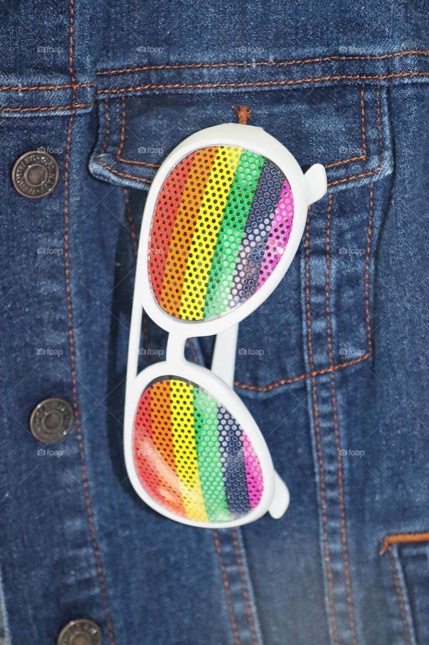 Rainbow glasses in pocket