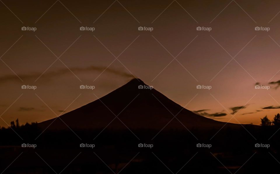 Silhouette of a Volcano at Break of Dawn