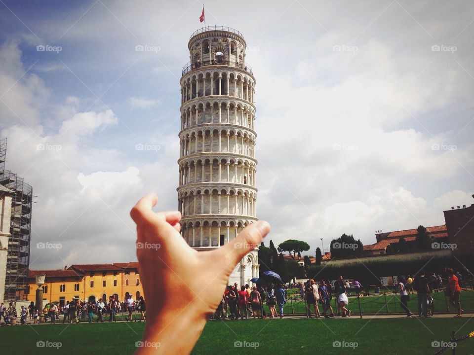 Pisa tower in the hand 