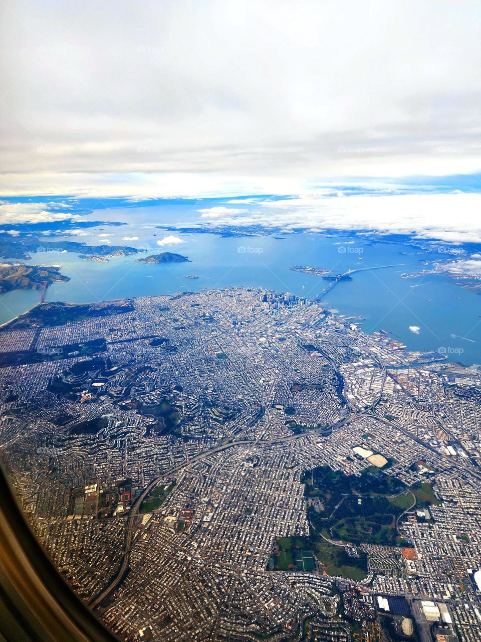 Flying over the city of San Francisco the view contains some of the most famous sights from the Golden Gate Bridge to Alcatraz and the Bay Bridge