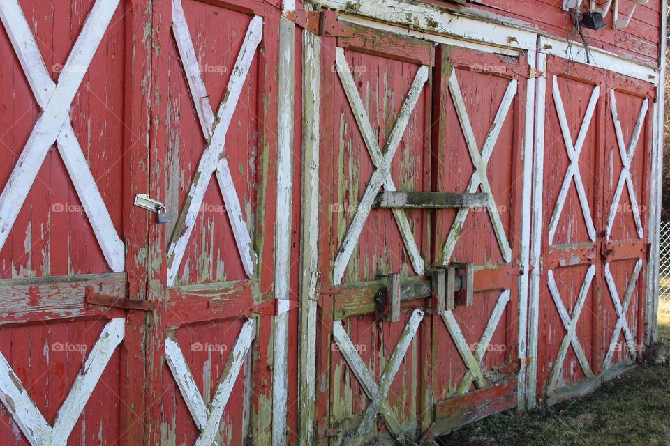 historical red and white doors on a barn in midwest