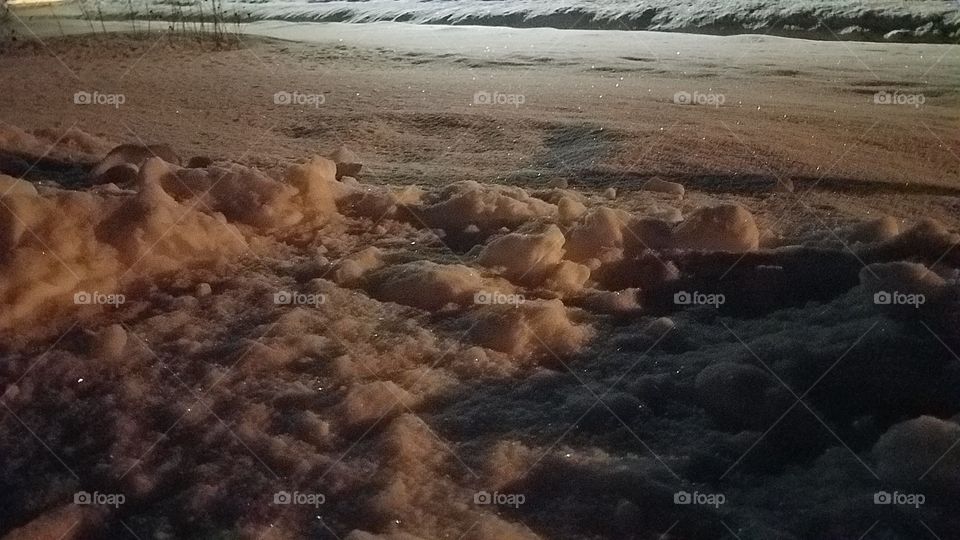 snow glistening in moonlight