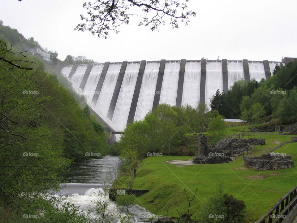 Lush green around the gushing dam