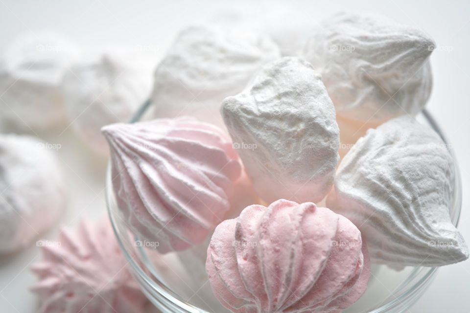 pink an white sugar meringues which background tasty delicious food