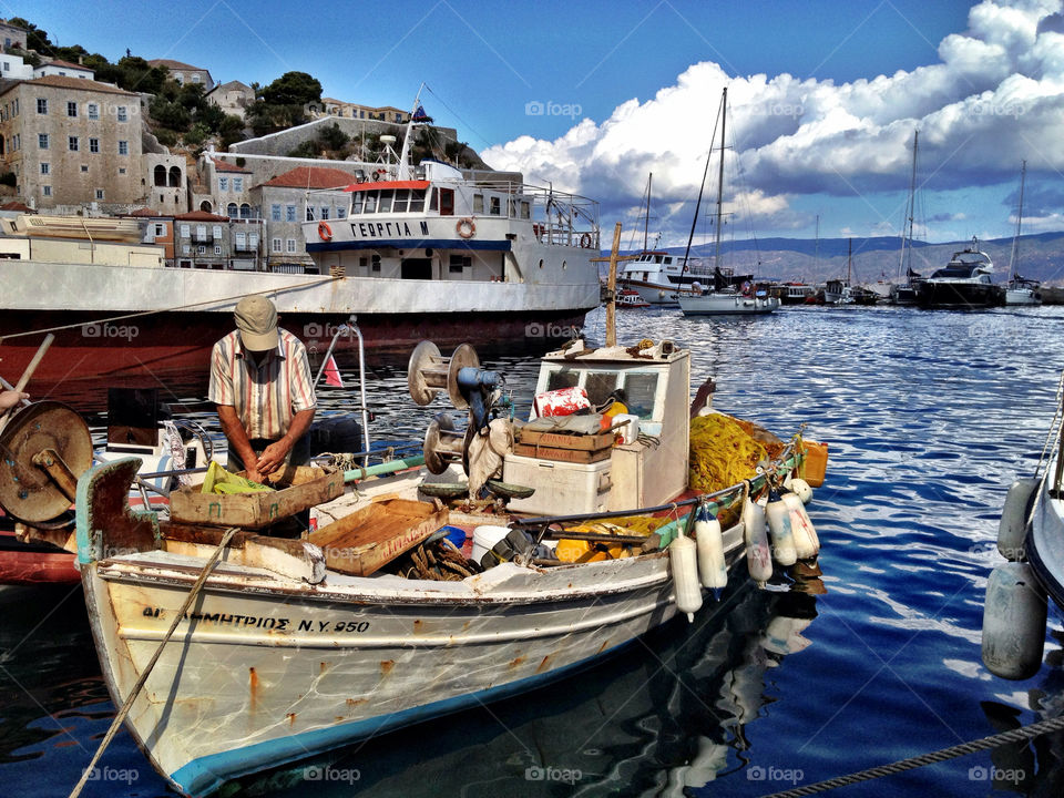 boat port greece fisherman by diaplous