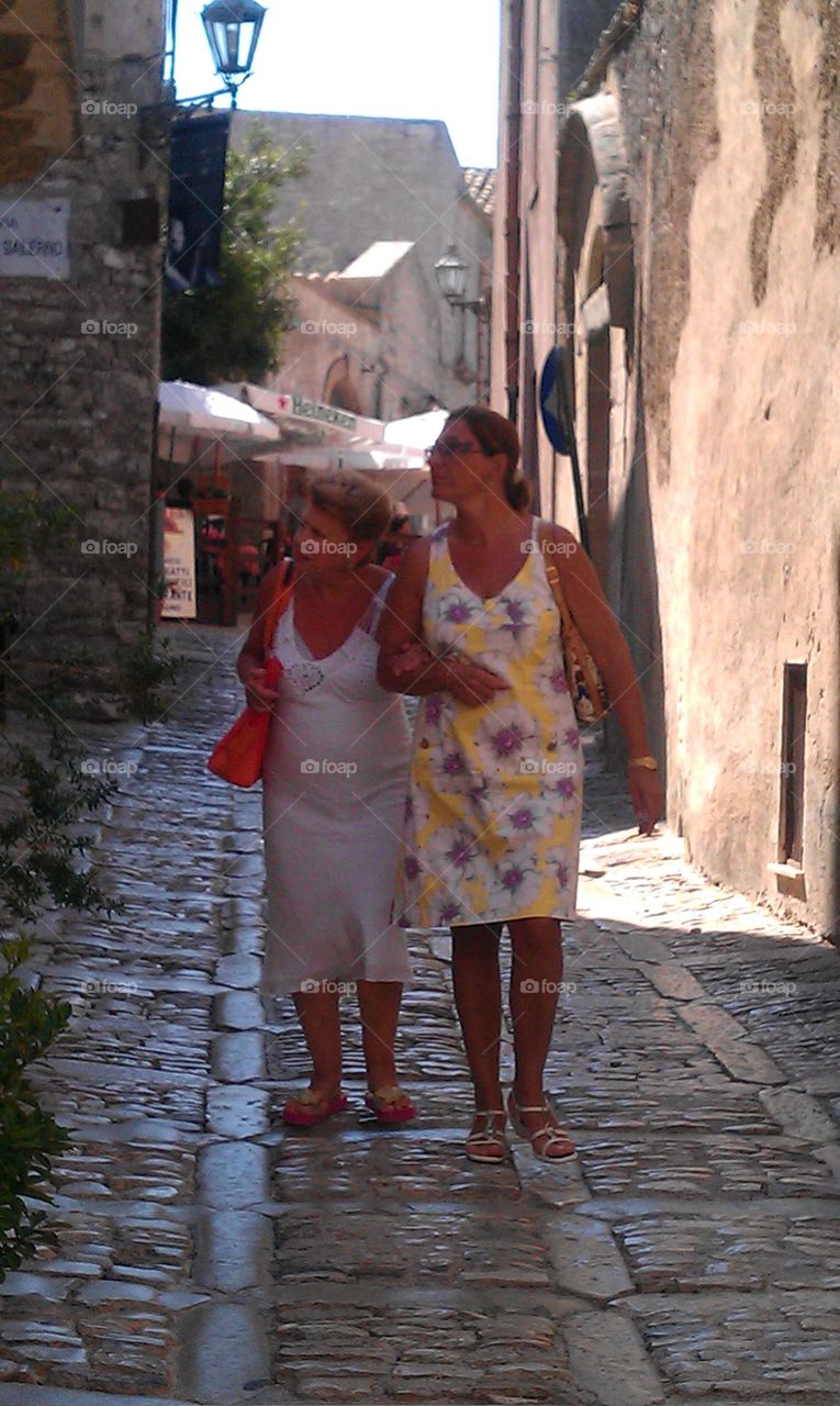 Two ladies in an alley