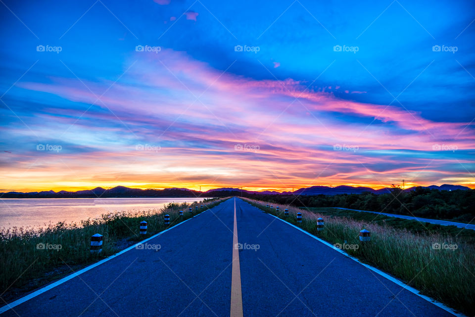 Long road in the beautiful land scape