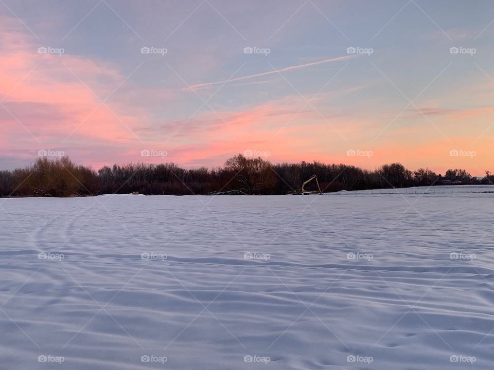 Sunset with a backhoe