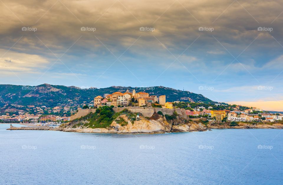 Calvi village, Corsica island. Castle on rocky hill, beautiful landscape of Calvi village, Corsica island, France