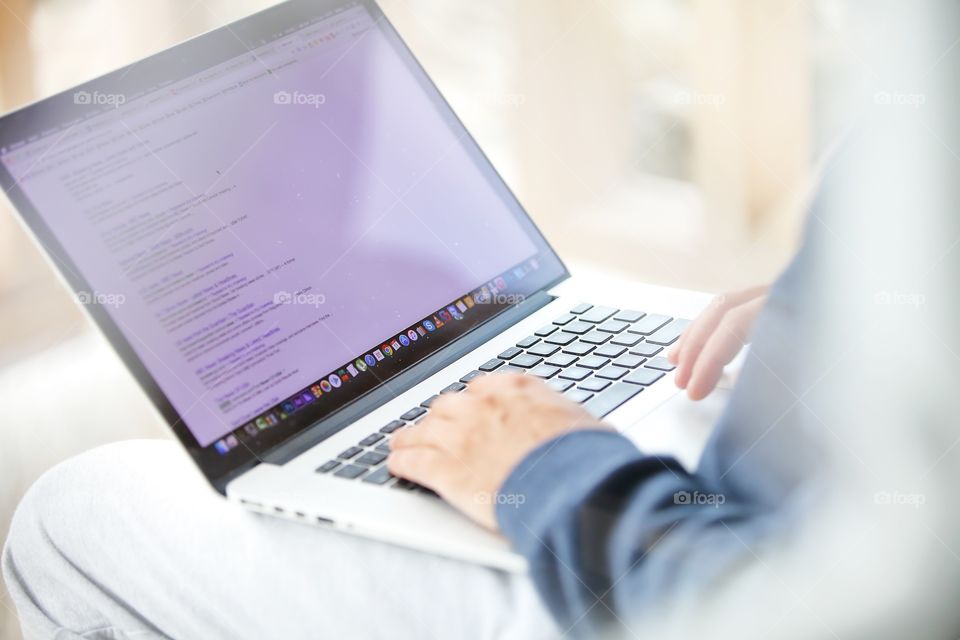 man working with laptop