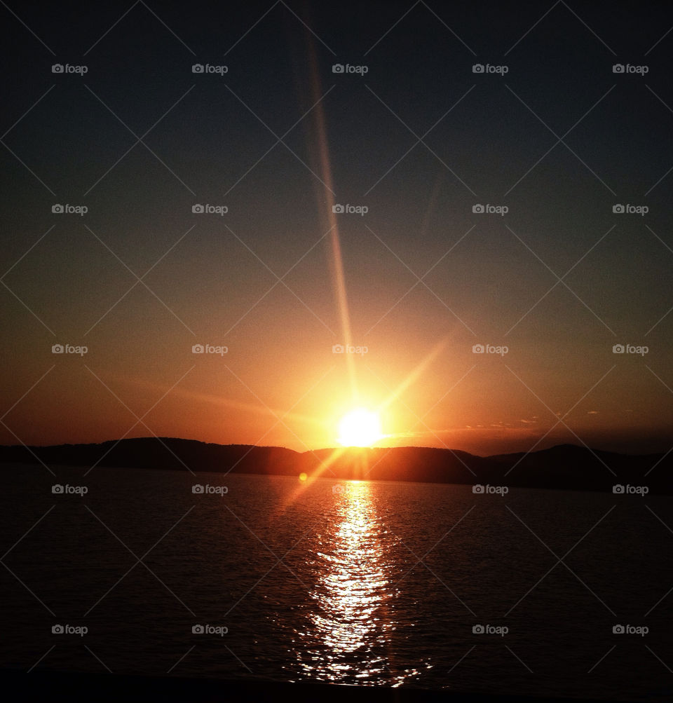 sunset train river moving by delvec