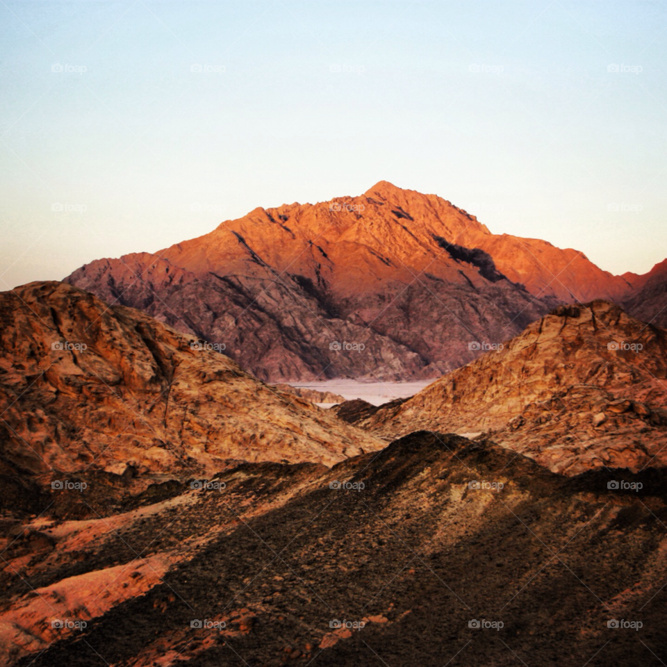hot sunset rocks desert by martynmcgoun