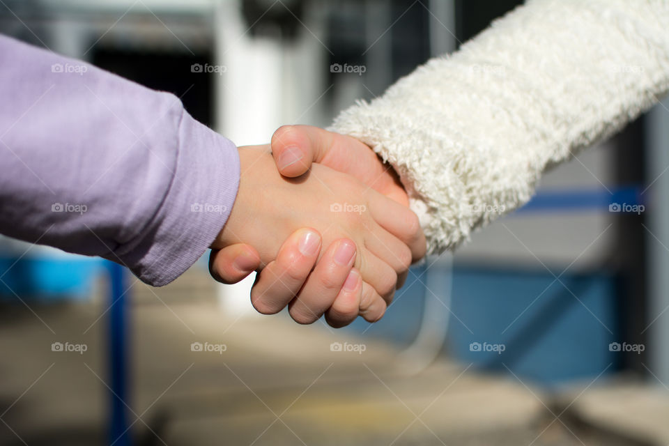 kids shaking hands