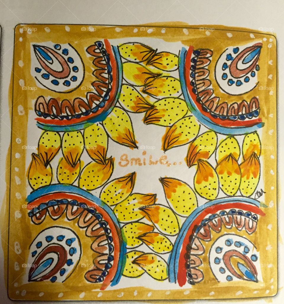 I drew and watercolored this Zentangle of yellow flowers 