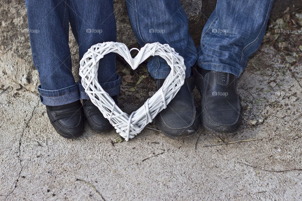 shoes with heart shaped twigs at the feet