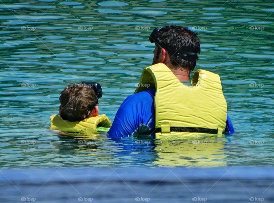 Father And Son Swimming
