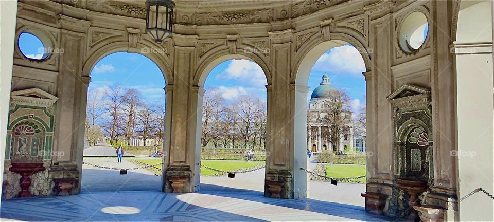 This pavilion is a temple to “Diana” in the “Hofgarten” or “Court Garden”, a park in “Munich”, capitol of “Bavaria”. It stands in the center of various walkways that radiate out in a star shape with lawn in between. 2024. Hypnotic Productions