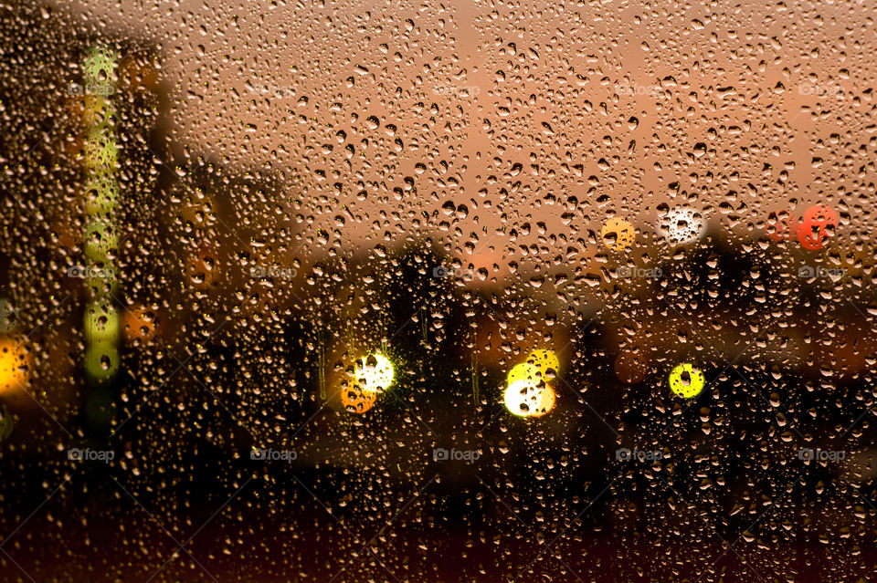 Close-up of raindrop on glass
