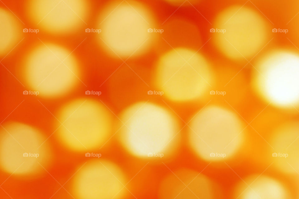 Yellow bokeh background. Gold bokeh background.