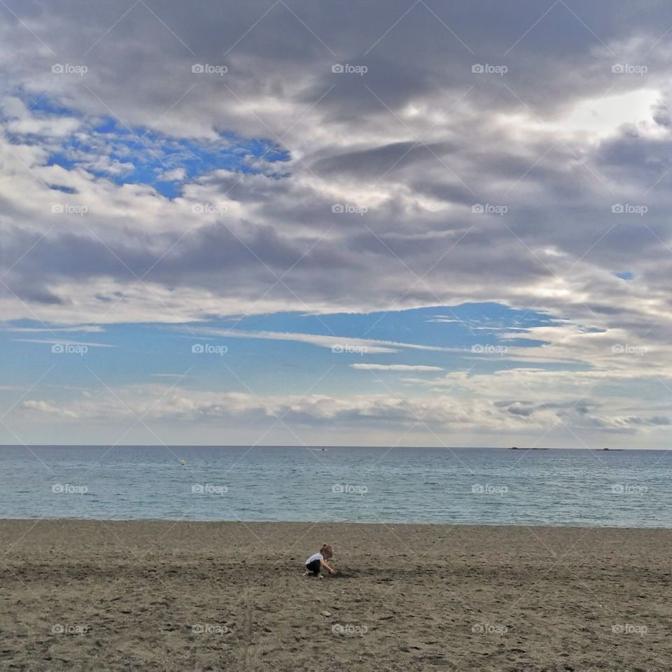 Quiet winter sunset at the beach in Torrox Costa, Malaga