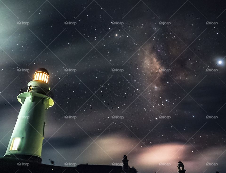 A lighthouse and the Milky Way