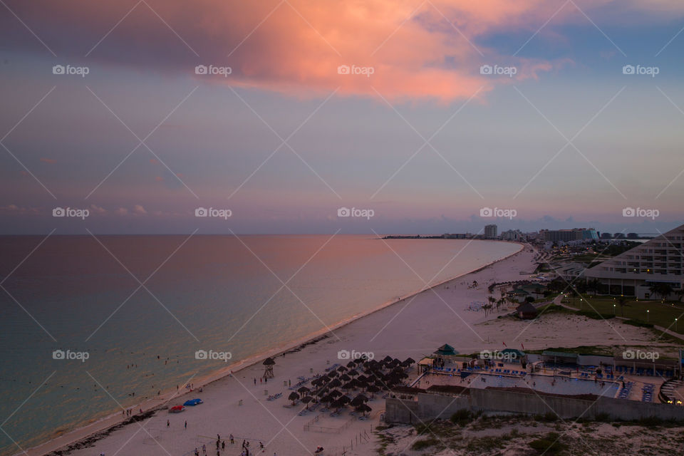 "CANCUN shore at sunset" 