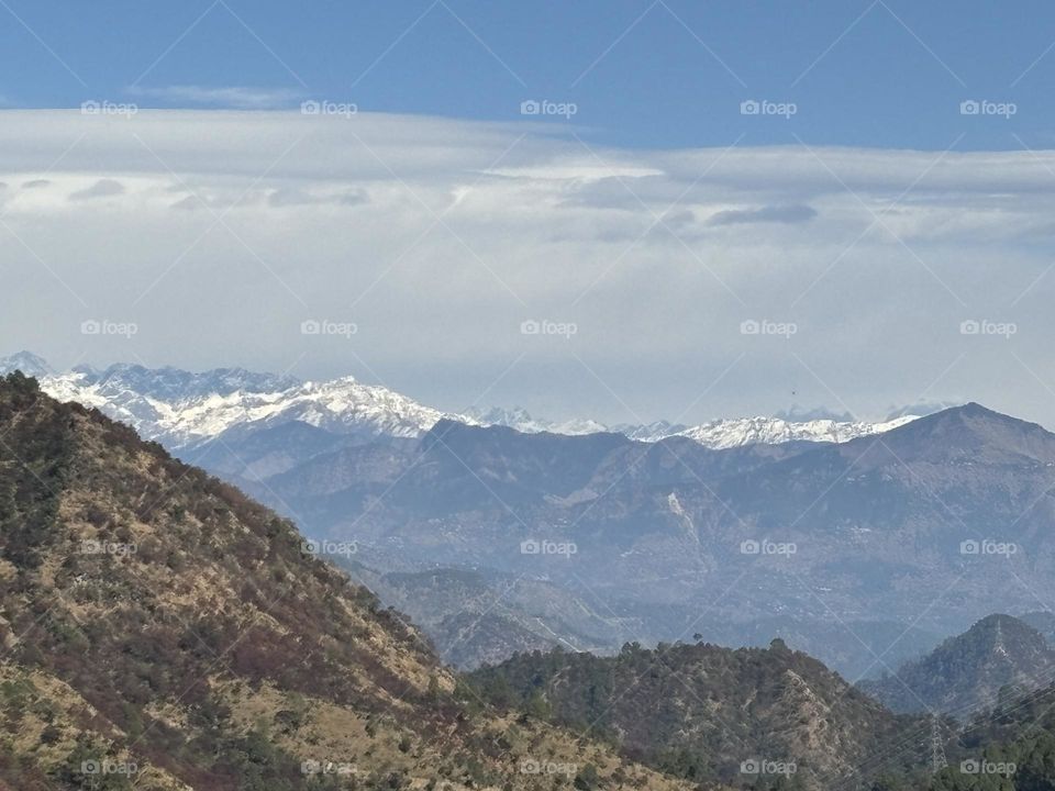 Distant view of the snow-clad peaks of the Himalayas