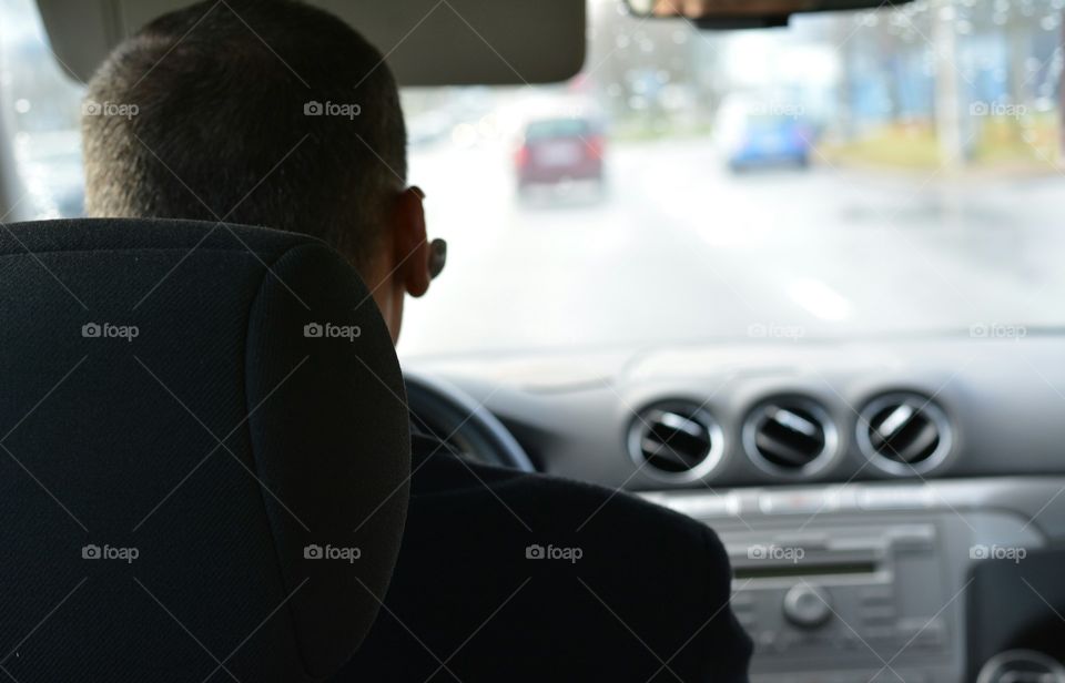 Man driving a car street view